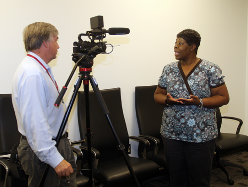 Columbus Ledger reporter Mike Haskey interviewing Sharron Cook