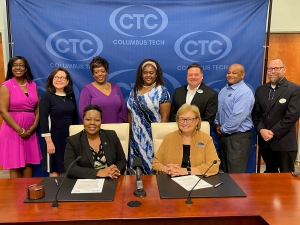 Leaders from Columbus Tech and Troy at the signing ceremony